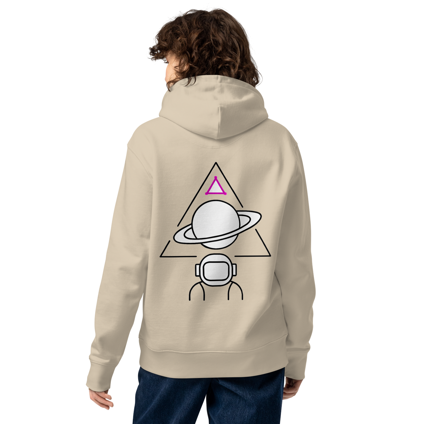 Woman wearing beige hoodie with space design on back
